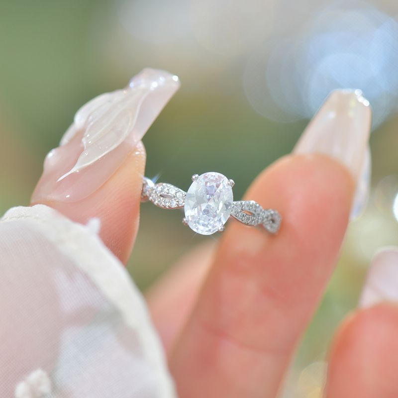 A921 Französischer leichter Luxus, exquisiter, täglich geformter, mikroeingelegter Zirkonia-Taubenei-Diamant-Schatz in Blau_voghion.com