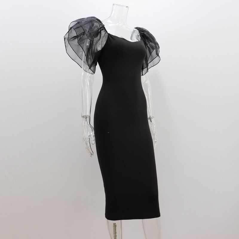 Enges sexy Kleid für Frühling und Sommer 2023, neues schwarzes Netz mit Lotusblattärmeln, quadratischer Kragen, langer Rock für Frauen_voghion.com