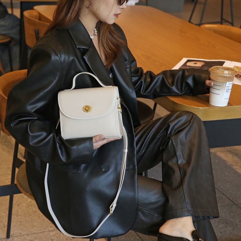 2024 Nieuwe koeienhuid Wo's veelzijdige mode high-end echte leren kleine suikerklontje niche schouder crossbody tas voor_voghion.com