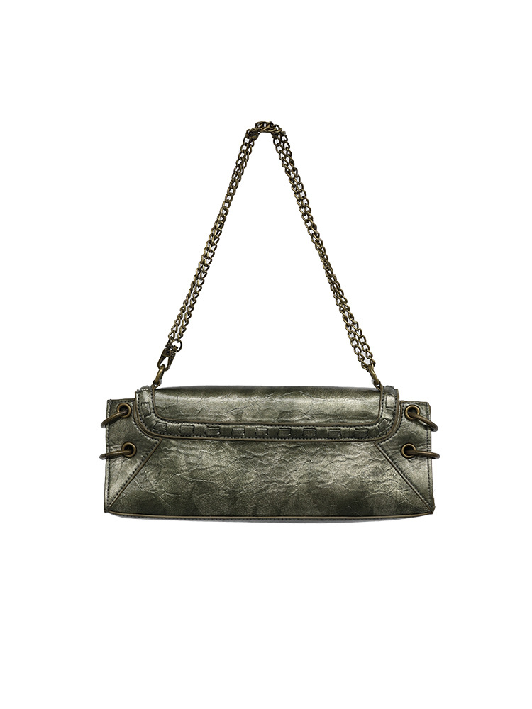 Design originale di Meiya Fibbia con chiusura subcultura vintage, borsa sottobraccio in rame antico e oro, borsa a tracolla, abito da sera_voghion.com