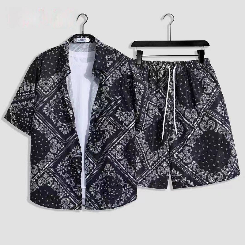 Conjunto informal de dos piezas con camisa de flores y pantalones cortos sueltos estilo vacaciones en la playa para hombre_voghion.com
