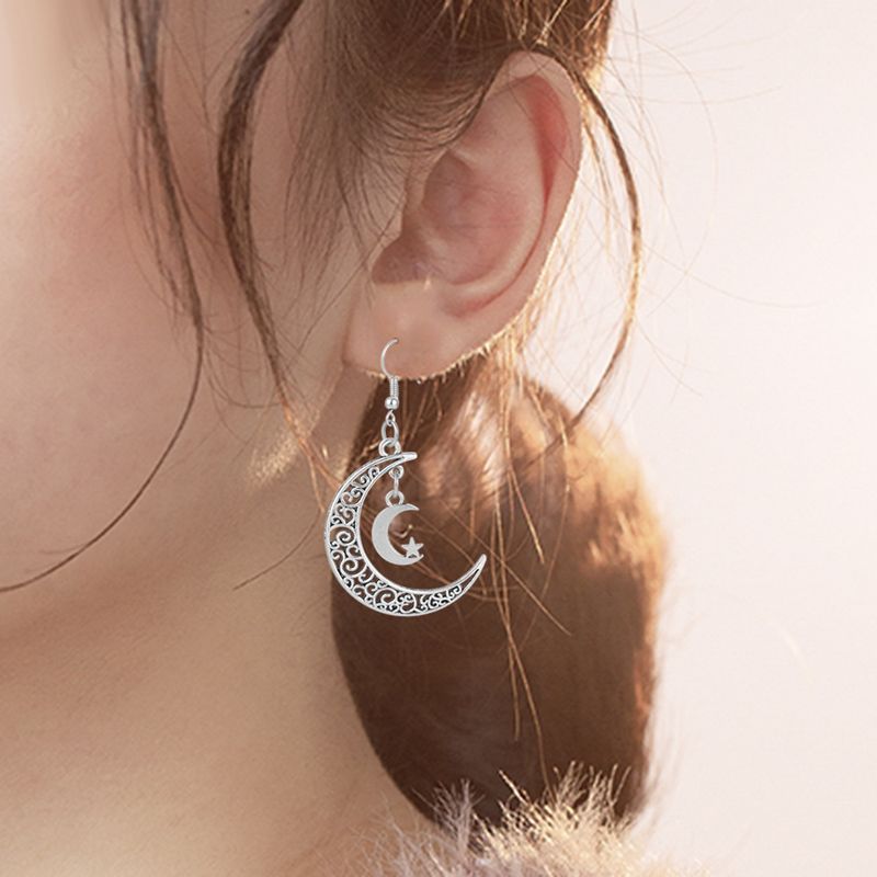Pendientes de estrella de aleación de luna hueca Pendientes de gancho en forma de media luna_voghion.com