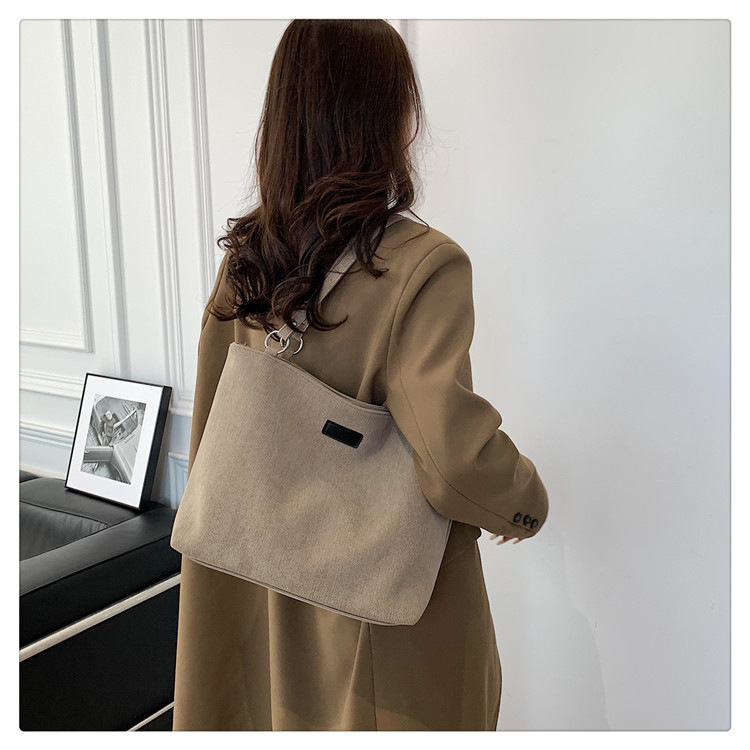 Canvas multifunctional bag women's simple and versatile commuter shoulder bag large capacity fashion tote bag_voghion.com