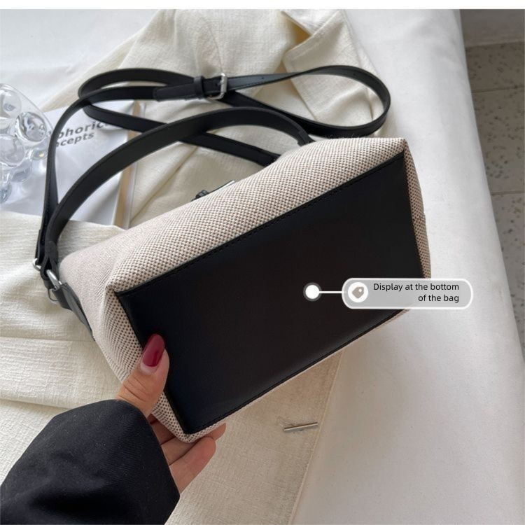 Design de nicho da moda deste ano 2025 Novas bolsas femininas casuais versáteis de lona crossbody de mão_voghion.com