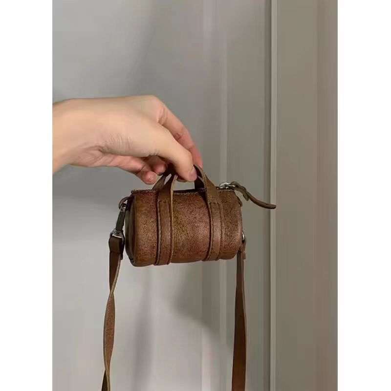 Niche High-End 2025 Summer New Brown Exquisite Neck Hanging Cylinder Single Shoulder Crossbody Mini Bag_voghion.com