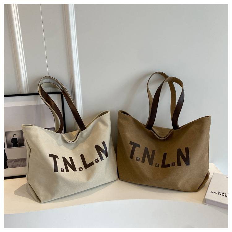 Bolsa de lona de grande capacidade feminina nova cor sólida bolsa de ombro casual versátil sacola estudante universitário classe sacos de deslocamento_voghion.com
