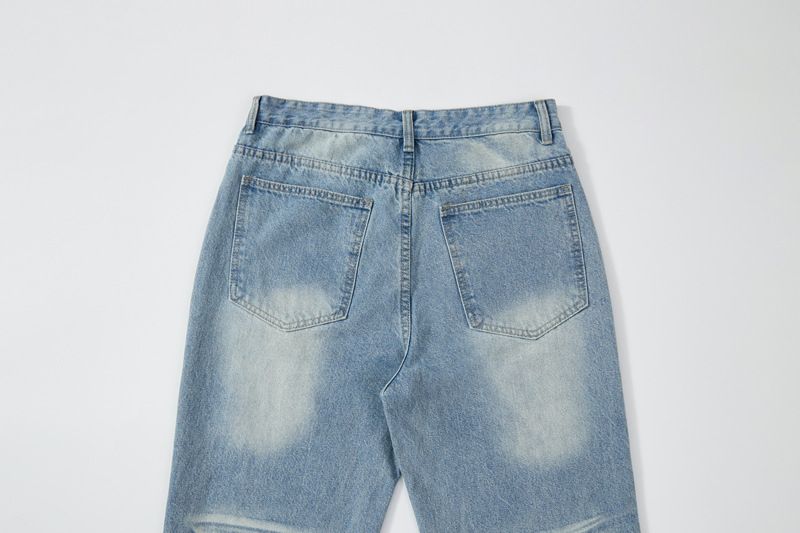 Ropa para hombre: Vaqueros lavados en azul hielo con ondas de agua y bigotes de gato desordenados, pantalones holgados._voghion.com