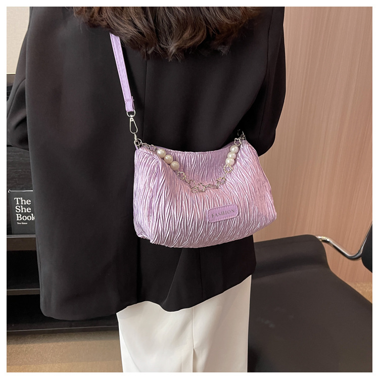 Väska Damer 2023 Nytt mode High-end All-match nischdesign Enfärgad canvas bärbar axel crossbody trendig väska_voghion.com