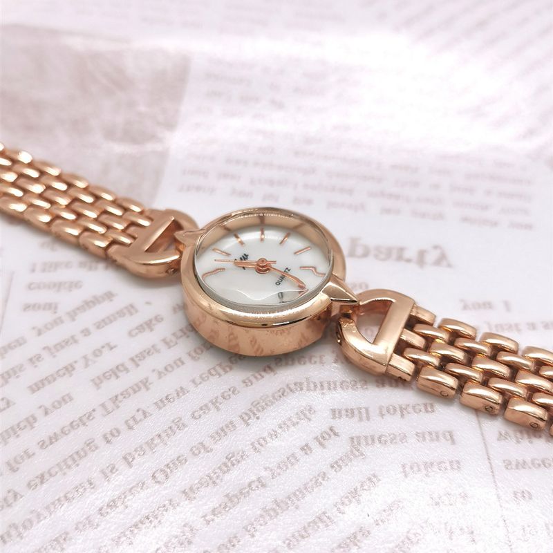 Mode Rose Gold Kleine Zifferblatt Quarz frauen Armband Kreuz Spiegel Luxus Dame Uhr_voghion.com