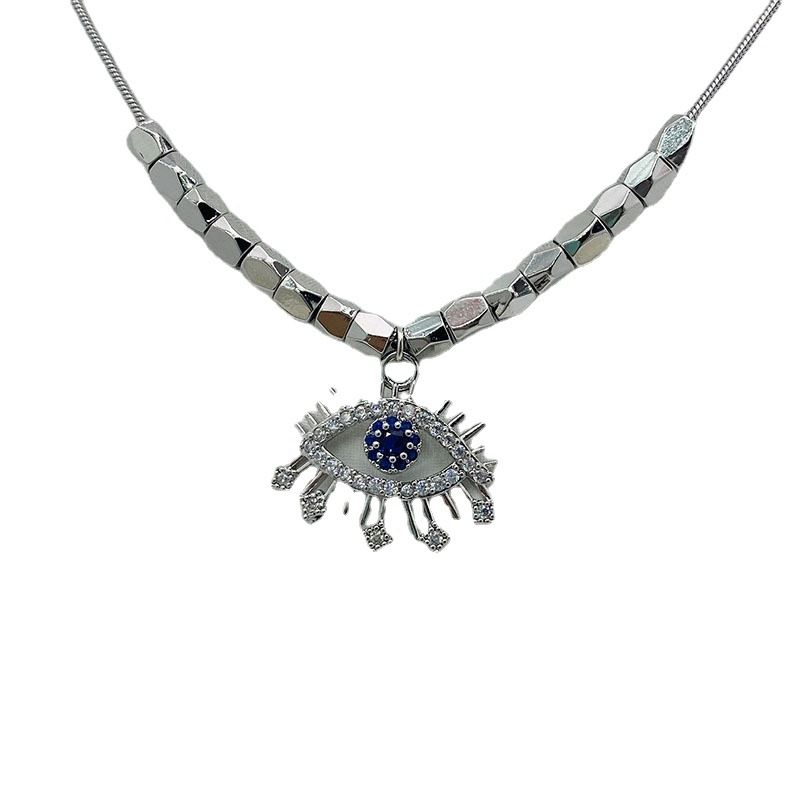 Collana con ciondolo a forma di occhi di zircone di alta qualità e catena a forma di osso, design unico e di lusso alla moda del 2022_voghion.com