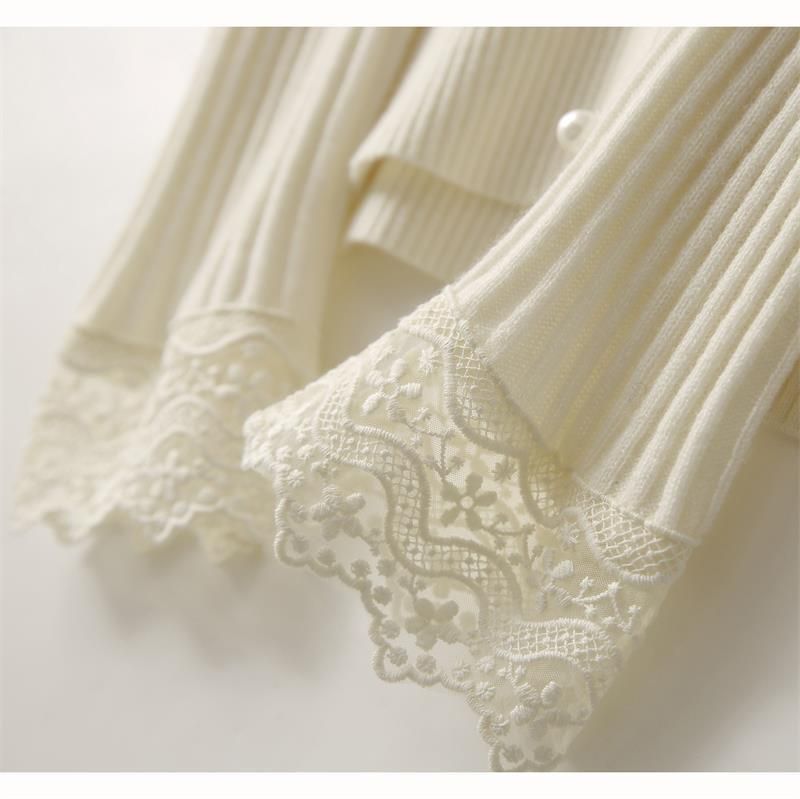 Vêtements pour femmes Chemise à col en V avec nouveau pull de printemps et d'automne Haut de style occidental en dentelle tricotée pour le printemps et l'automne_voghion.com