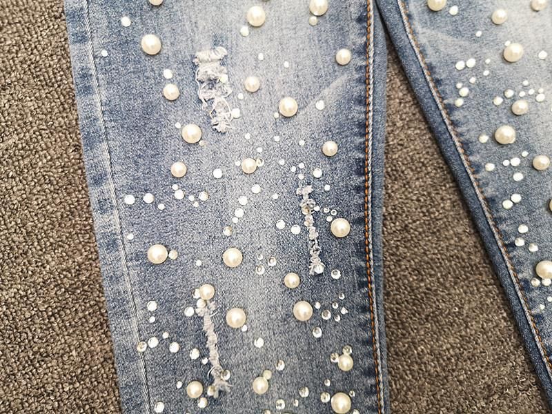 Damen Kleedung Beaded Denim Hosen fir Fraen Fréijoer a Summer nei All-Match Knäppercher elastesch schlank breet Been néng Punkt Hosen_voghion.com