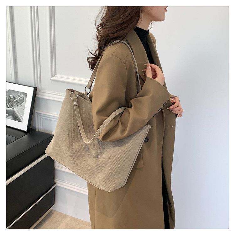 Canvas multifunctional bag women's simple and versatile commuter shoulder bag large capacity fashion tote bag_voghion.com