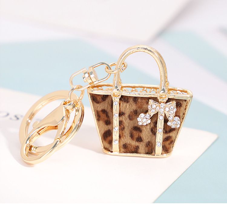 Portachiavi creativo a forma di borsa con stampa leopardata, ciondolo per auto squisito, piccolo regalo._voghion.com