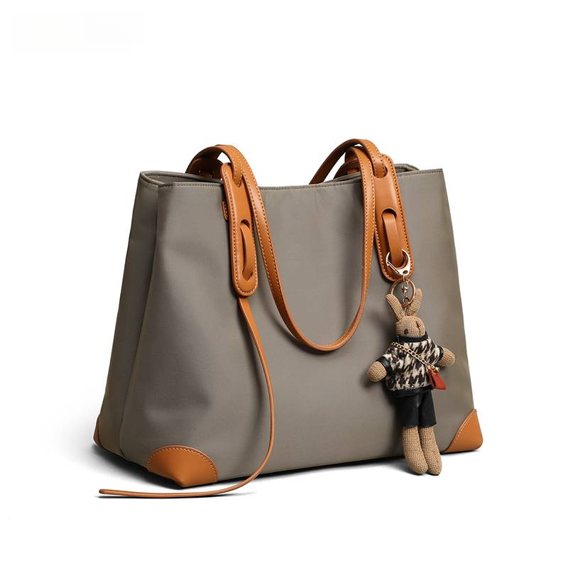 Nuova borsa a tracolla di alta qualità, elegante, grande, in tela, da donna, da uomo, in pelle, con tracolla, in metallo e con lettere._voghion.com