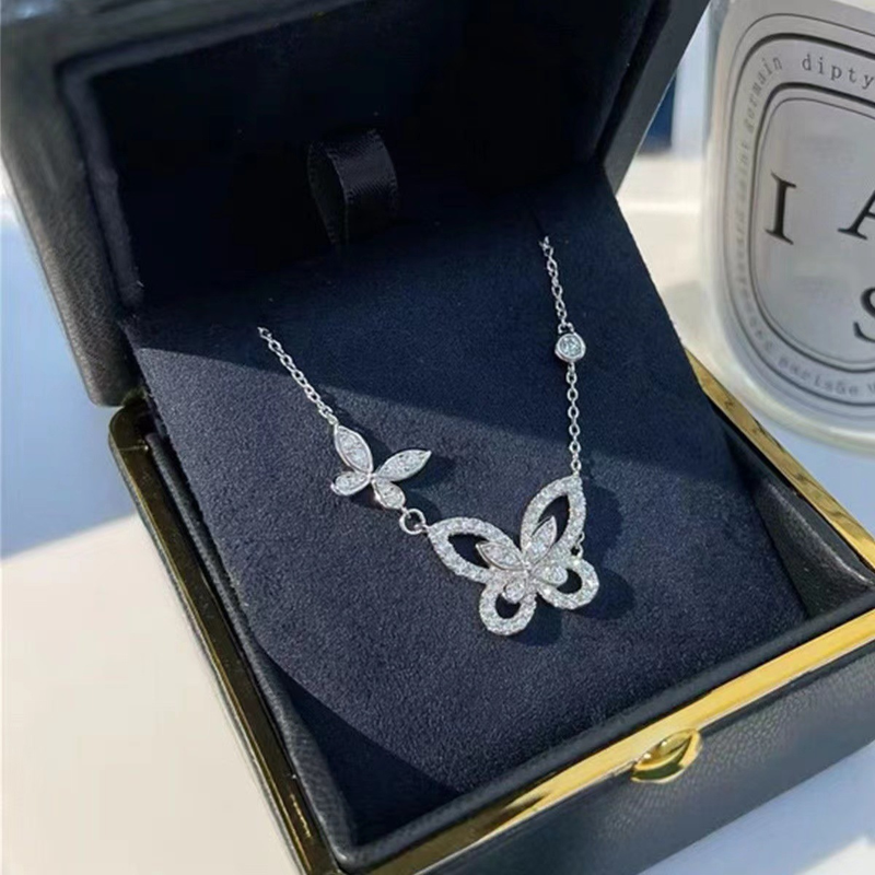 Designerski lekki luksusowy naszyjnik z motylem Phantom z cyrkonii, damski, bezbarwny luksusowy mały łańcuszek z kości z tytanu_voghion.com