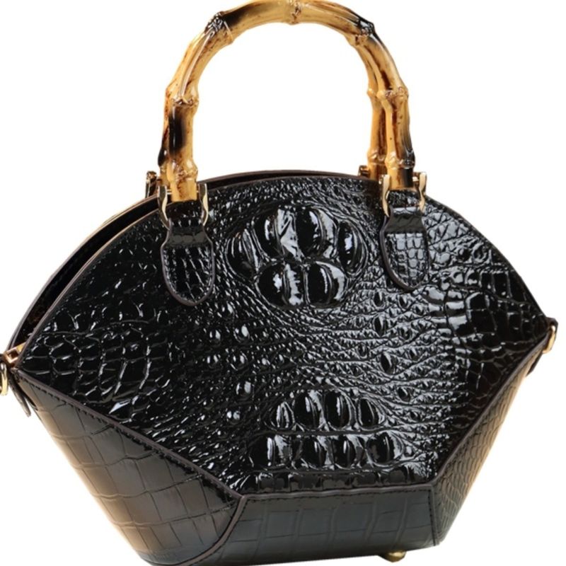 Hard skin women's bag 2024 new fashionable bamboo section handbag atmospheric niche design shell shoulder cross_voghion.com