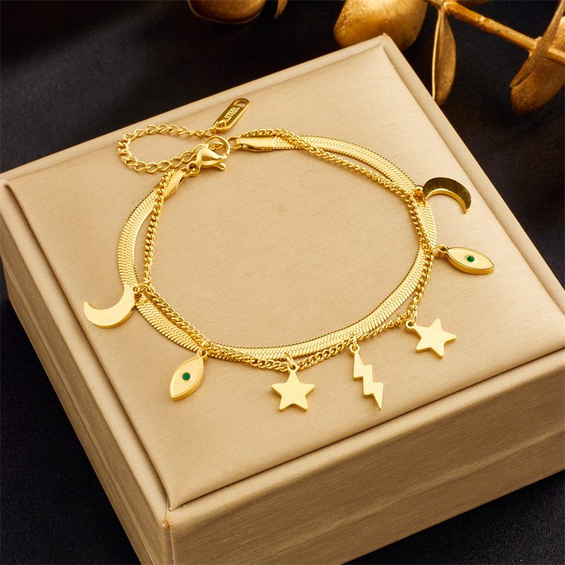 European and American fashion niche retro high-end double-layer stacking diamond round blue eye star lightning pendant bracelet_voghion.com