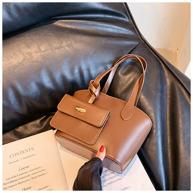 Borsa piccola portatile di moda estiva nuova borsa a secchiello casual semplice da donna 2023 borsa per ascelle suocera con trama di nicchia_voghion.com