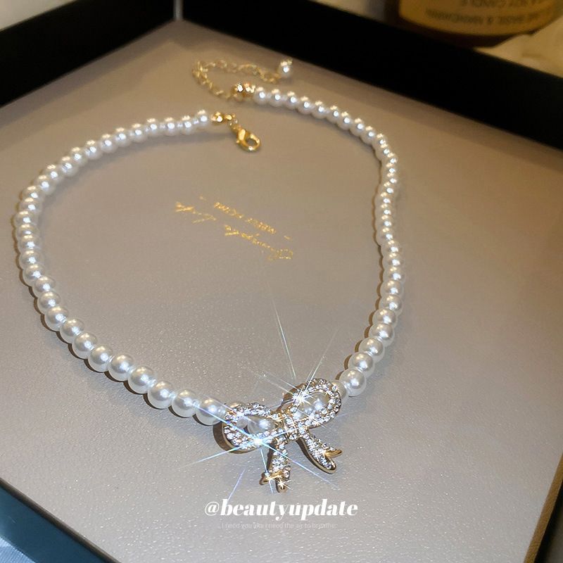 Choker con catena a clavicola, intarsiato di perle in stile francese, con fiocco di diamanti, celebrità di Internet, super fata, design sensato_voghion.com