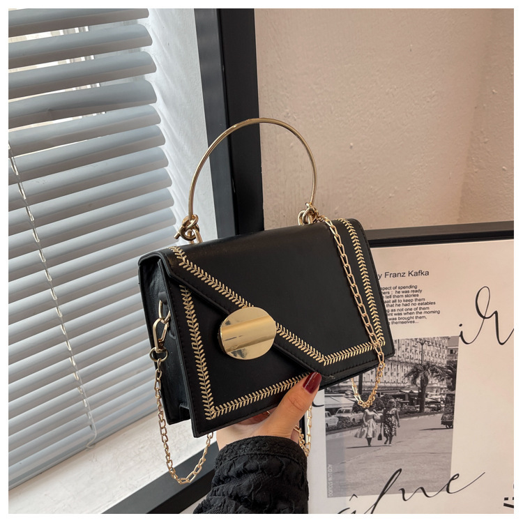 Borsa da donna di moda francese di fascia alta Borsa a tracolla portatile a catena di fascia alta con design di nicchia irregolare retrò Borsa piccola quadrata_voghion.com