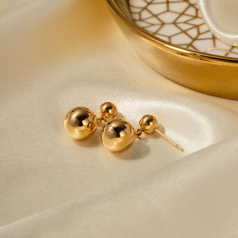 Orecchini lunghi versatili alla moda in stile Instagram con pendente a sfera in acciaio inossidabile oro 16k_voghion.com