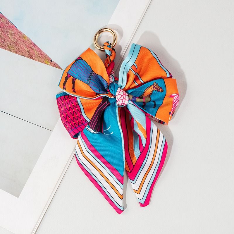 2025 Autumn And Winter Fashion Bag Accessories Keychain Woven Bag Pendant Decorative Bow Bag Pendant Versatile High Sense Retro_voghion.com