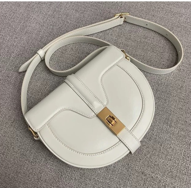 Sella a forma di T 2024 Nuova moda singola spalla diagonale a cavallo borsa in pelle da donna casual a metà giro tenuta in mano_voghion.com