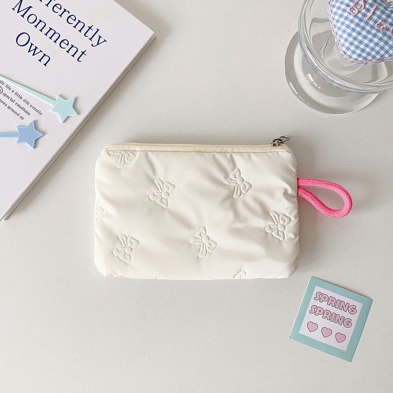 Borsa portamonete piccola portatile con fiocco in argento lucido per trucco, auricolari, cavi dati_voghion.com