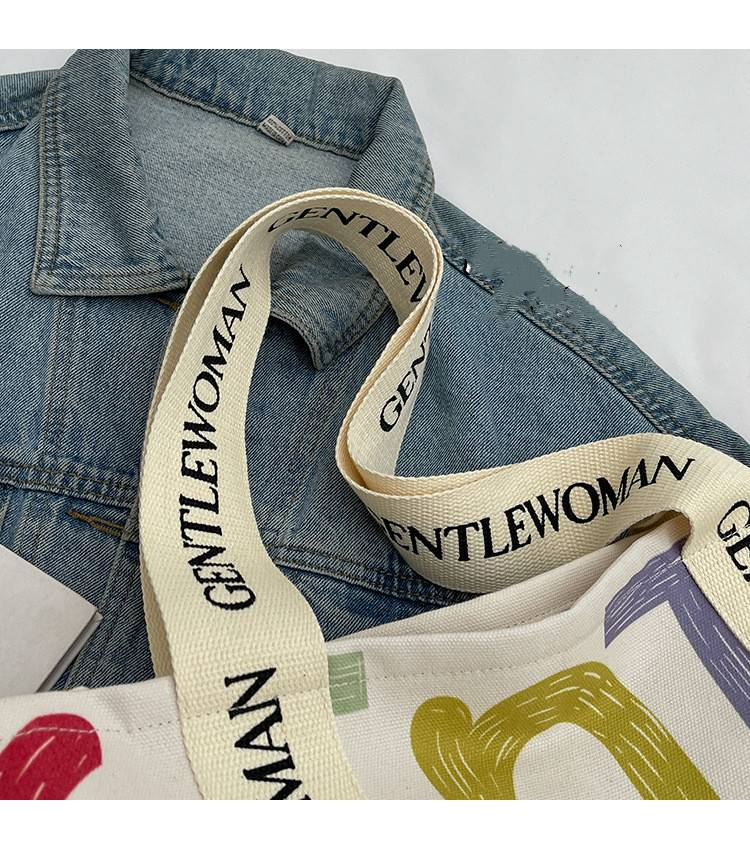 Bolso de lona a la moda para mujer, bolso grande de hombro con borla y letras, material vaquero, bolso de compras de gran capacidad para mujer_voghion.com