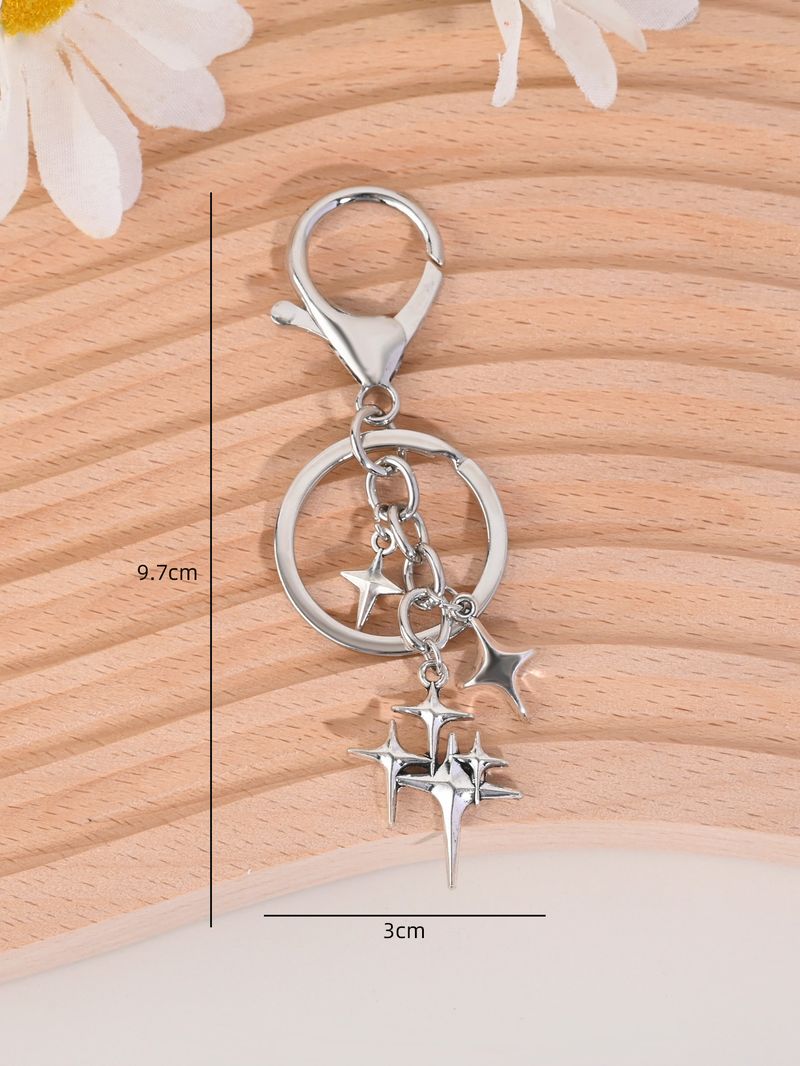 Colgante de llavero para coche con forma de estrella de cuatro puntas, estilo coreano, sencillo, ideal como regalo de San Valentín._voghion.com