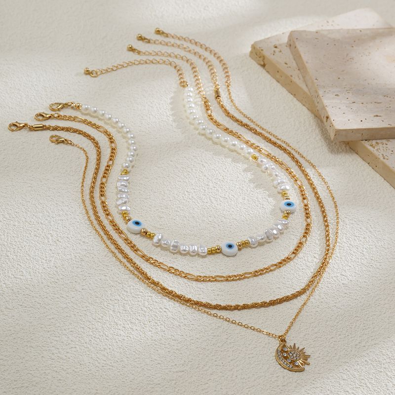 Gioielli transfrontalieri europei e americani, collana di perle di forma speciale in stile etnico, catena a clavicola in lega retrò con ciondolo a forma di occhio di sole_voghion.com