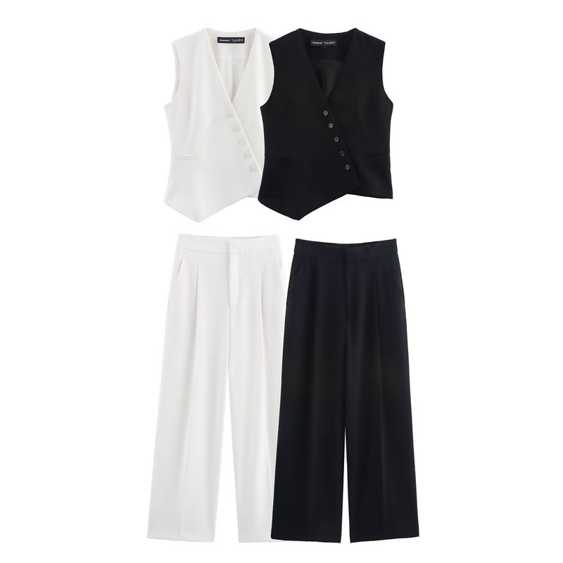 Traje de mujer de moda con chaleco asimétrico sencillo con cuello en V y pantalón ancho plisado._voghion.com