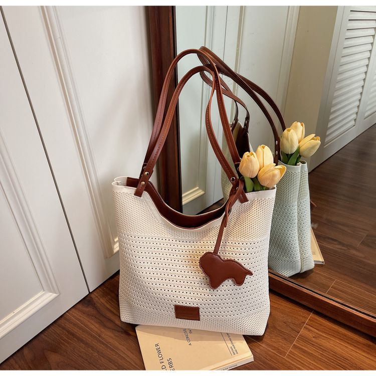 Lässige, gewebte Einzelschultertasche mit großer Kapazität 2025 Neue Tragetasche aus hohlem Netzgewebe für den Urlaub und den Strand für Frauen_voghion.com