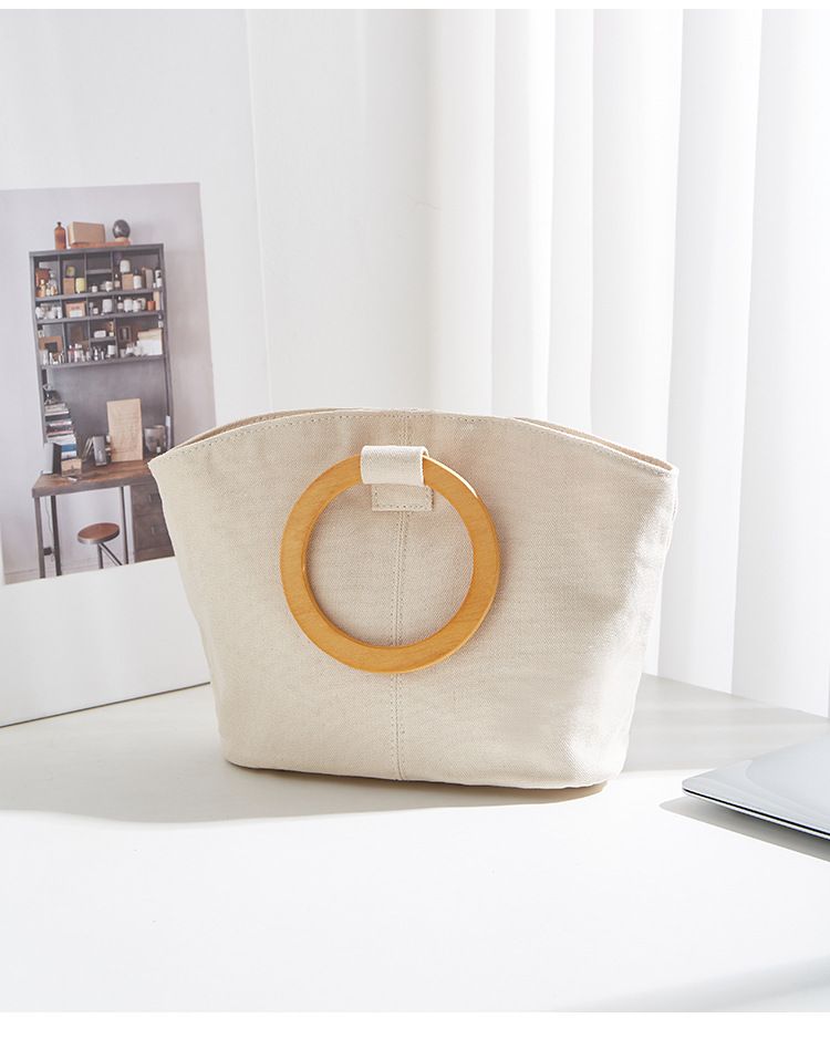 Borsa versatile e di grande capienza in versione coreana, la nuova borsa da donna minimalista in tela di quest'anno, manico in legno_voghion.com