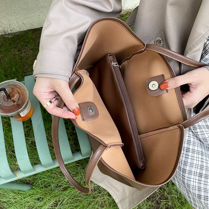 Tote Women's One Shoulder Large Capacity Student Commuter Mommy Soft Leather Book Bag Instagram Korean Version 2024 New_voghion.com