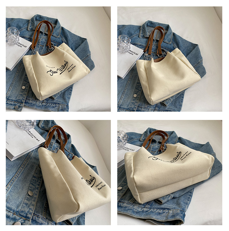 03 New Canvas Girls' Chain Advanced Sense Trend Portable Tote Bag Commuting Simple and Large Capacity_voghion.com