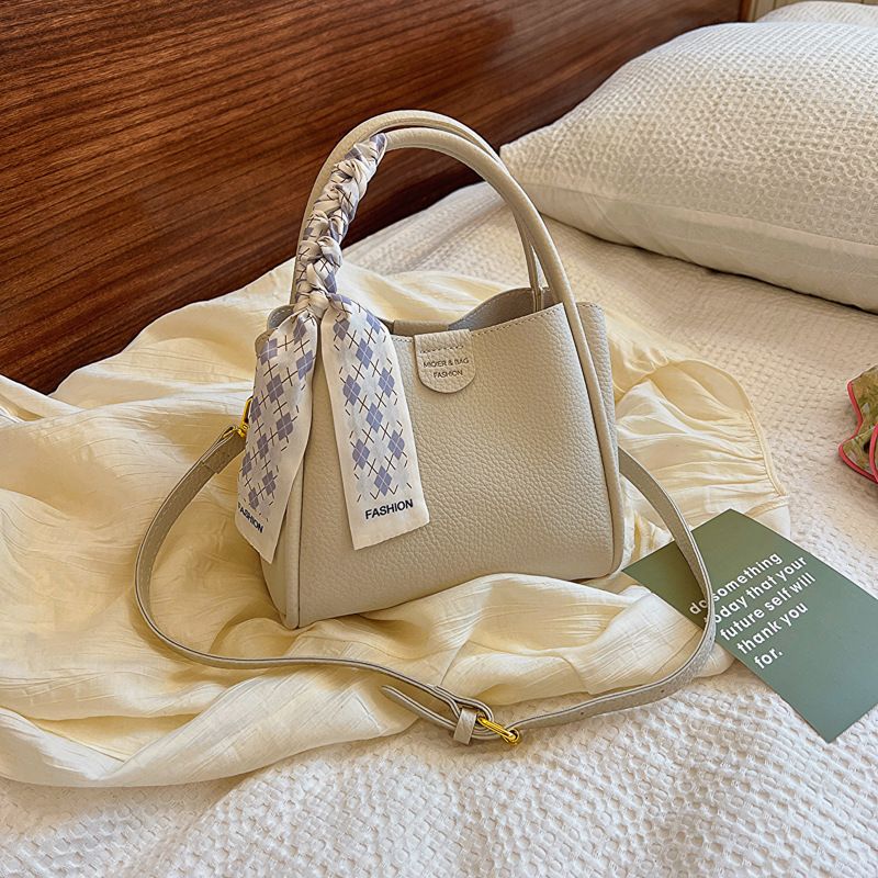 Tendenza femminile di quest'anno: borsa a mano con cestino di verdure, nuova borsa a secchiello in morbida pelle, borsa a tracolla da pendolare_voghion.com