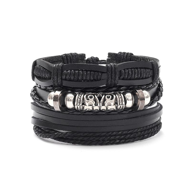 Bracciale unisex in pelle nera con teschio fatto a mano fai da te da uomo_voghion.com