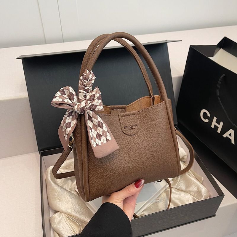 Borsa a mano per donna 2025 Nuova borsa a secchiello di nicchia, versatile, a tracolla, alla moda, da donna._voghion.com