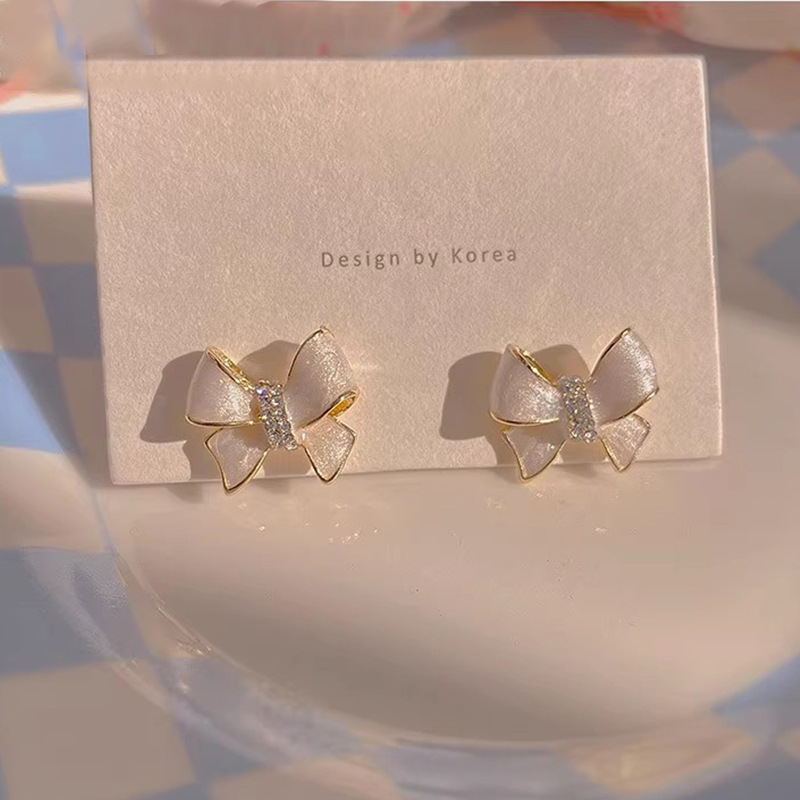 Orecchini da donna Orecchini ad arco con temperamento ad ago in argento Orecchini da donna di design di fascia alta per la nicchia estiva Nuovi orecchini alla moda all'ingrosso_voghion.com