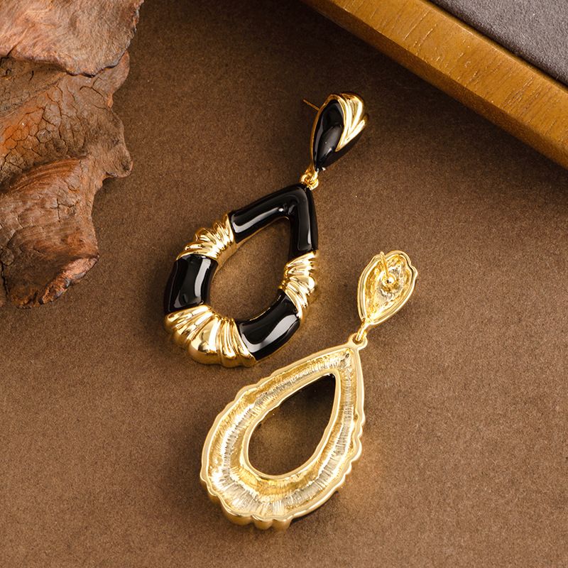 Elegante e lussuoso, stile antico, smalto a goccia, a forma di goccia cava, per donne con un temperamento di nicchia, di alta qualità._voghion.com