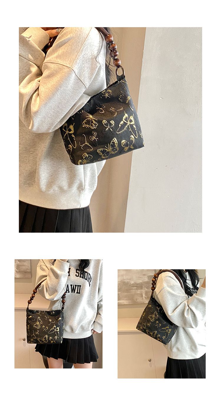 Borsa a mano in stile cinese, versatile, di alta gamma, estiva, da donna, con texture in bambù, 2025_voghion.com