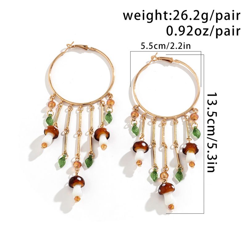 Orecchini da donna in oro, orecchini con grandi cerchi esagerati e pendenti con nappe, orecchini versatili in stile etnico a forma di foglia di fungo._voghion.com