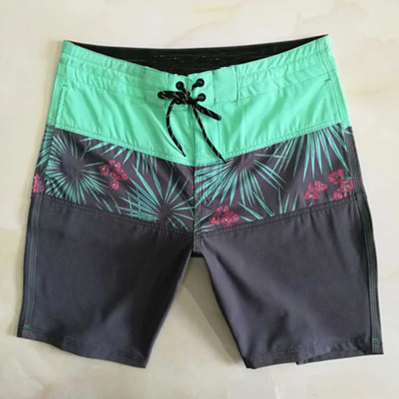 Herrenmode Marke 2021 Herren Strand Shorts Stretch Version des Drucks Wasserdicht Schnelltrocknend Badeanzug Casual Tauchen_voghion.com