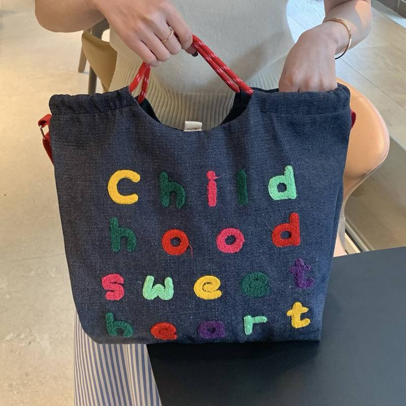Designer di tendenza della moda borsa in denim di grande capacità asciugamano monogramma borsa a tracolla in denim per studenti borsa per la spesa da donna_voghion.com