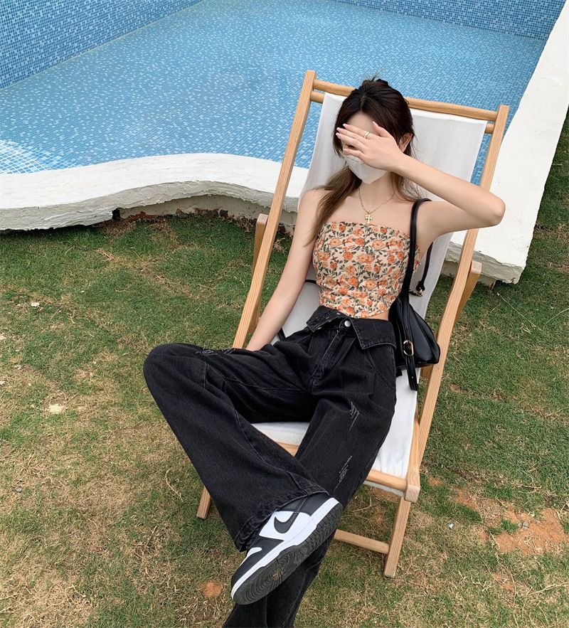 Pantaloni a gamba larga in denim a vita alta americani per donna, caratterizzati da un design piccolo che accentua una vestibilità aderente._voghion.com