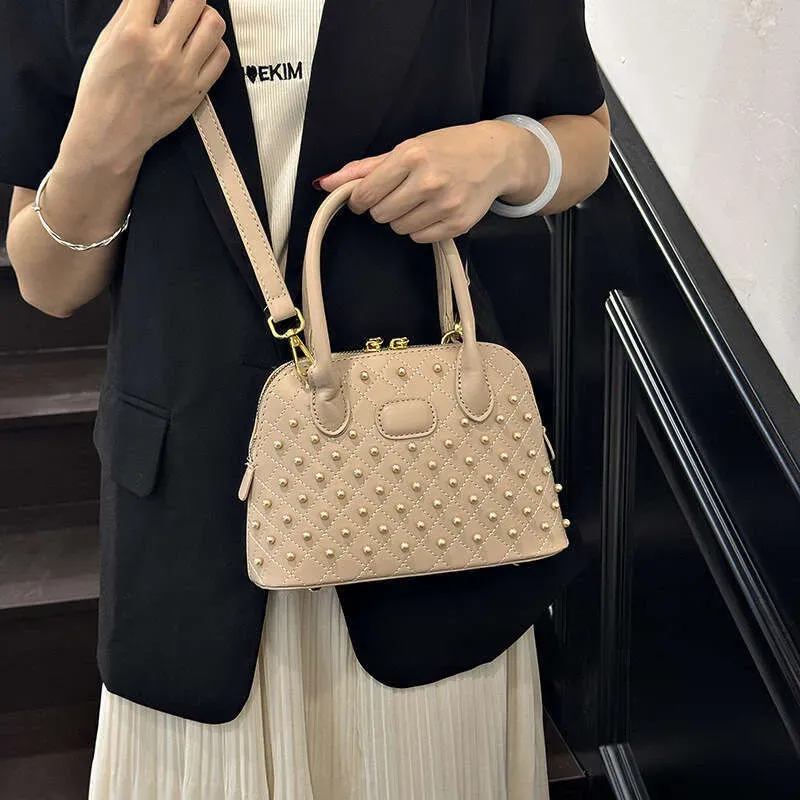 Fashion Designer Shell Bags For Women Elegant Rivet Handbag Versatile Large Capacity Shoulder Crossbody Bag_voghion.com