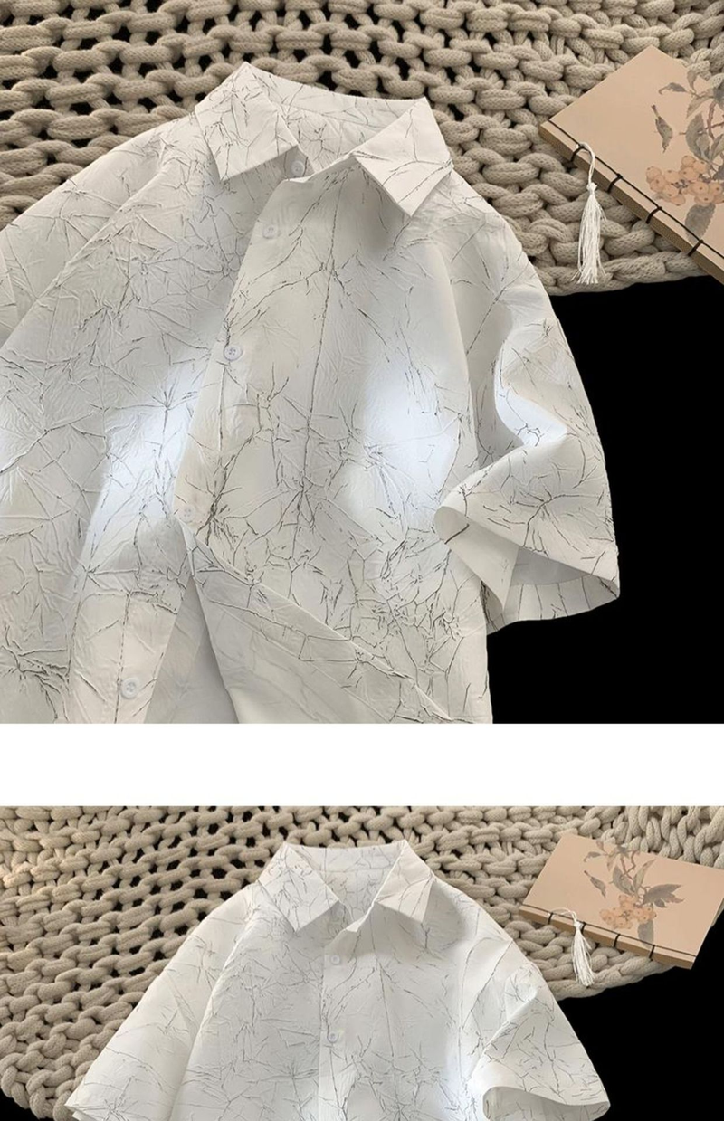 Camicia a maniche corte in seta ghiacciata plissettata per uomo in estate, un abito casual leggero, fresco, alla moda ed elegante con un design accattivante._voghion.com