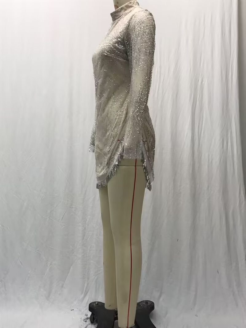 Abito da sera sexy a maniche lunghe con spacchi di nappe in oro e argento, da donna_voghion.com